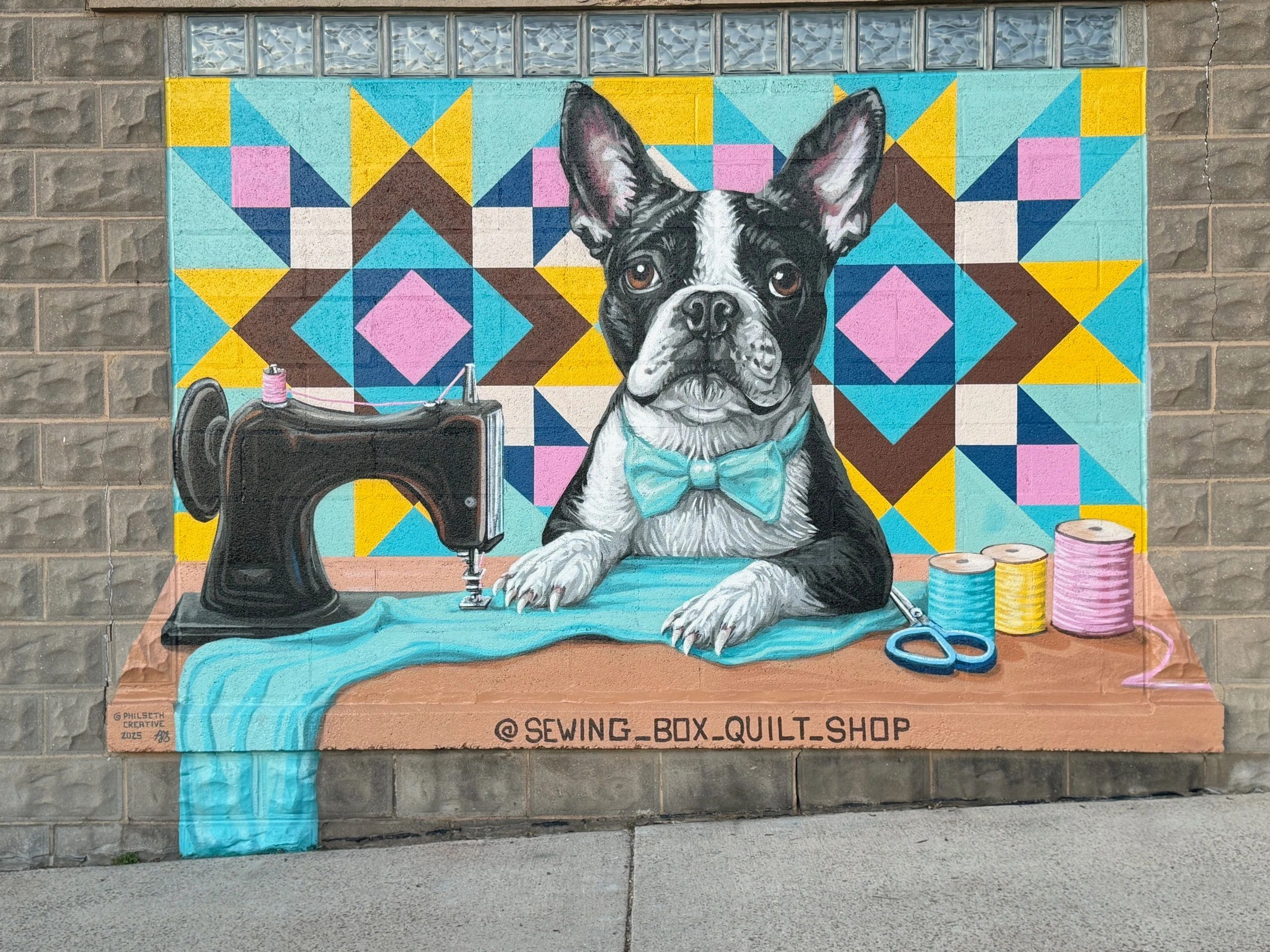 Bolt the Boston Terrier mural on the side of The Sewing Box Quilt Shop
